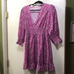 Cute long sleeve pink  mini dress flattering to figure